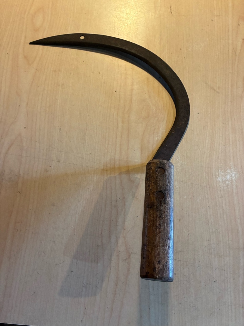 Vintage farm hand sickle with wooden handle